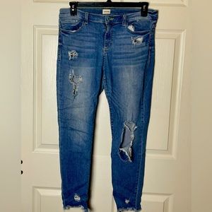 Distressed Mid-Rise Skinny Jeans